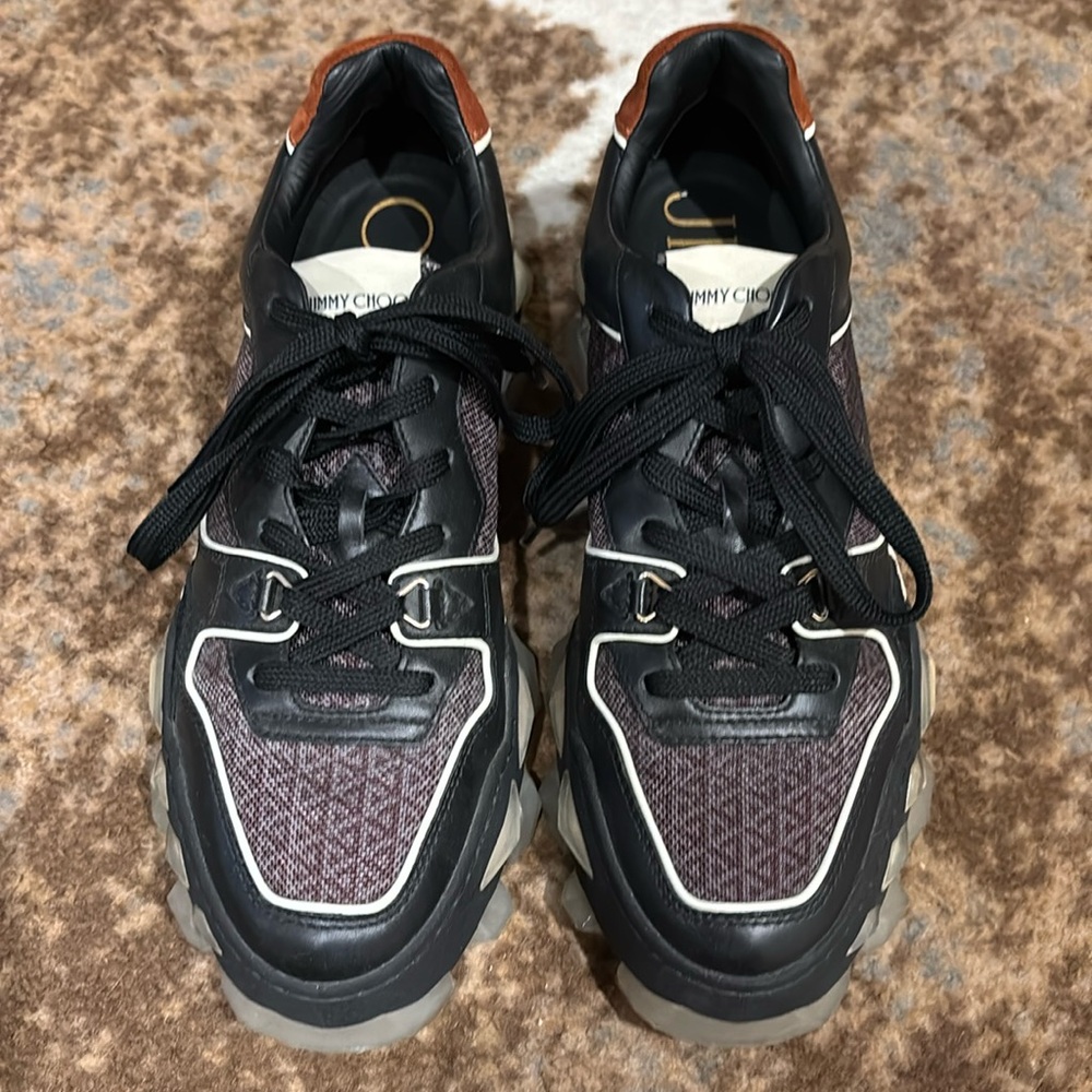 Jimmy Choo trainer only worn one time like new.
